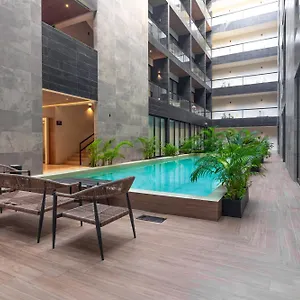 https://musa-del-carmen-by-boutique-apartments-mx.quintano-roohotels.com